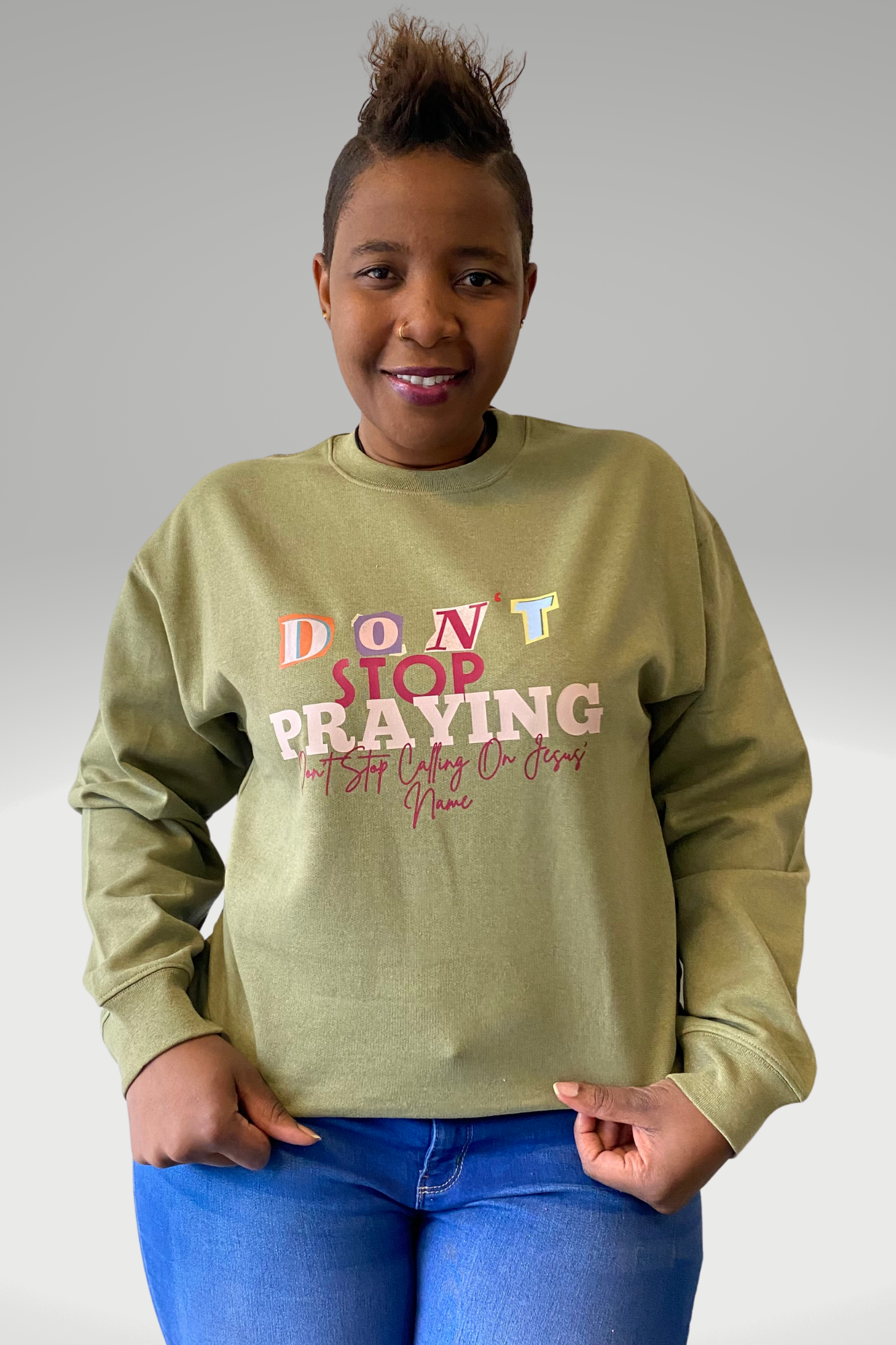 DON'T STOP PRAYING UNISEX SWEATSHIRT