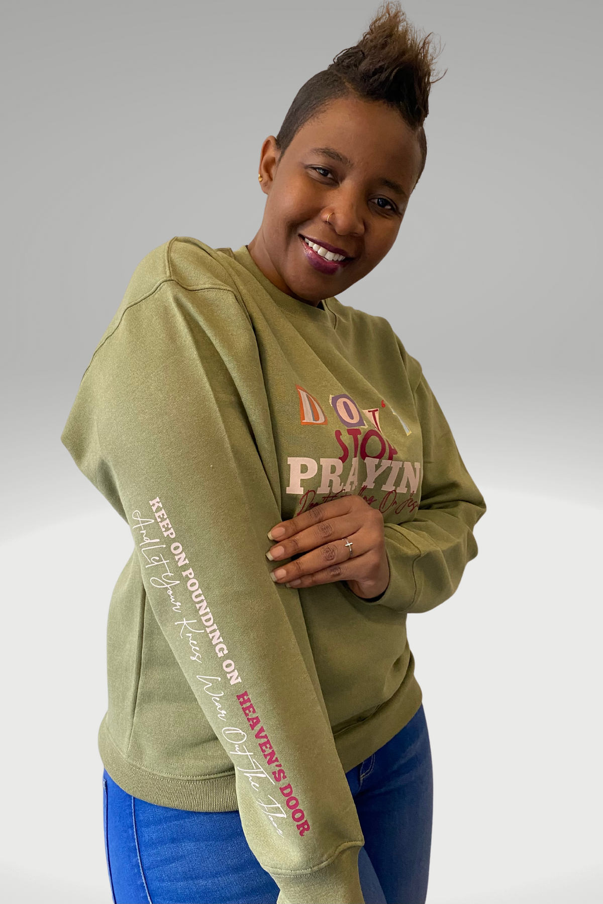 DON'T STOP PRAYING UNISEX SWEATSHIRT