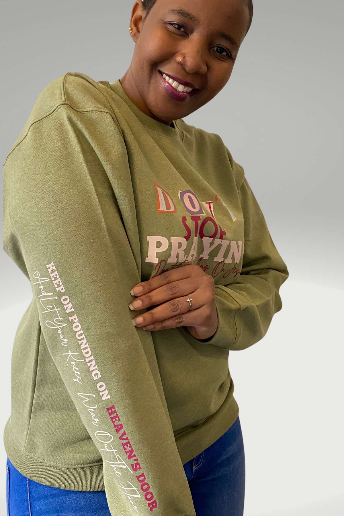 DON'T STOP PRAYING UNISEX SWEATSHIRT