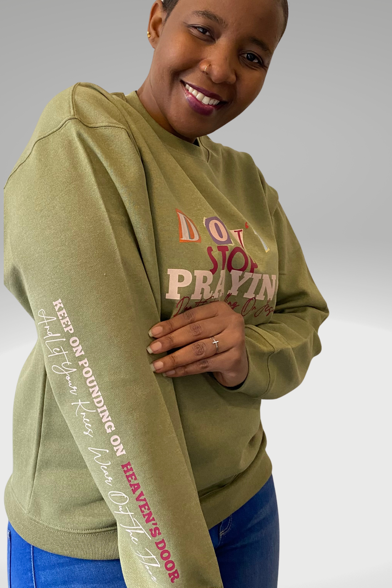 DON'T STOP PRAYING UNISEX SWEATSHIRT